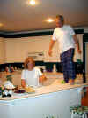 000406-amh-chris-kitchen-climbing-600.jpg (71198 bytes)