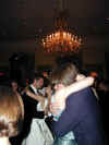 wdg-rcptn-stacey-johnn-hug-kw-dan-bkgrd-600.jpg (67190 bytes)