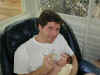 20020524-simon-dan-feeding-porch-1-600.jpg (65122 bytes)