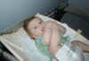 20021011-simon-changing-table-sucking-toe-3-600.jpg (57063 bytes)