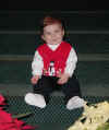 20021212-simon-pose-8-month-2-02-600.jpg (92027 bytes)