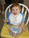 20030412-simon-bday-cake-39-eating-600.JPG (74973 bytes)