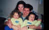 001123-kristen-dan-riley-carson-hug-600.jpg (42271 bytes)
