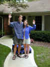 wt-returning-dan-kristen-2-waving-600.jpg (97752 bytes)